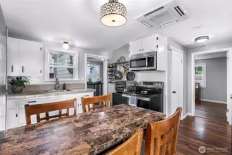 Kitchen view, hallway into 2 nd bedroom and door is for bathroom.