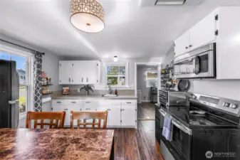 Kitchen view into flex room/dining room.