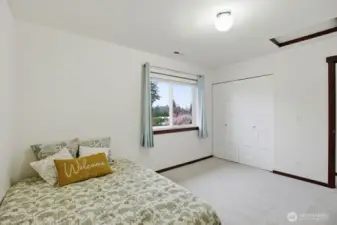 Spacious 3rd bedroom. Note: another full bath upstairs serves these 2 bedrooms.