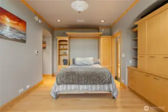 Private room off master is perfect multi purpose room with queen sized Murphy bed, built in closets and private bath access.