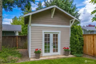 10 x 11 Cedar mini house shed is a nice addition to this fabulous yard.