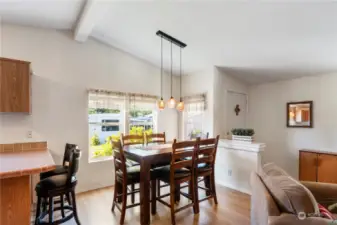 lovely dining area with updated fixture.