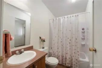 Guest bathroom located off the hall