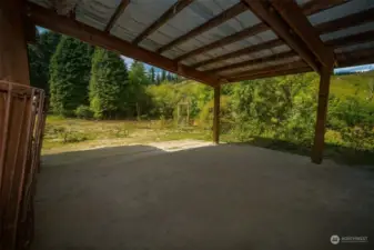 Covered shelter off barn