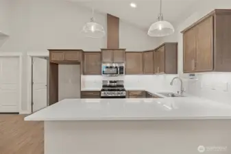 The eating bar is off the backside of the peninsula.