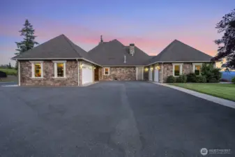 Garage parking for 4. There is an attached 2 door, 2-car garage and a detached garage/shop, and carport. Total covered parking for 6 cars