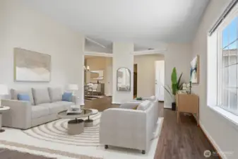 Formal living room with vinyl plank flooring and vaulted ceilings.  Virtually staged photo