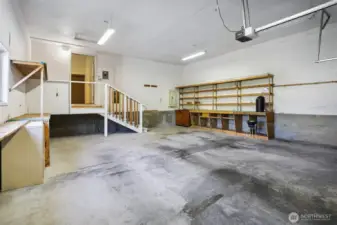 Attached oversized 2 car garage with workshop space.