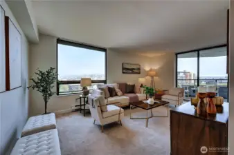 Immaculate & beautifully maintained high floor two-bedroom NE corner home with picturesque views!