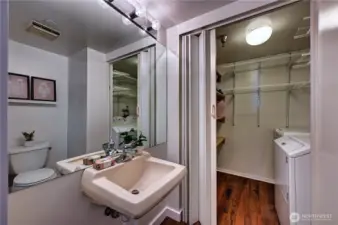 An additional powder room for convenience for guests & laundry/storage area.