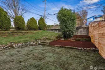 Landscaped and fenced backyard