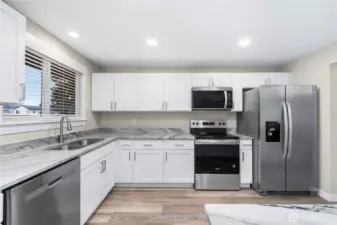 Brand new cabinets, countertops, SS appliances, sink and hardware