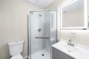 Primary 3/4 bathroom completely updated with touch lighting mirrors