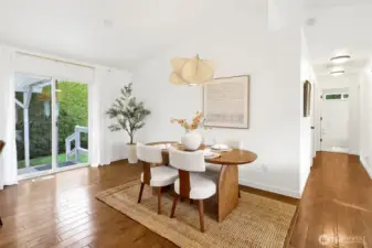 The dining area just off the kitchen offers flexible space that can easily expand when needed and opens seamlessly to the covered patio for effortless indoor-outdoor living. Down the hall to the right, you’ll find all the bedrooms and bathrooms, thoughtfully tucked away for privacy.