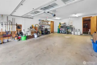 The attached two-car garage at the ground level features wall-mounted storage organization. The door on one side opens to the unfinished space for storage or expansion potential!javascript:__doPostBack('m_ucDetailsView$m_btnSave','')