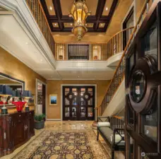 Step inside the grand foyer, where you will find high-end custom marble flooring, Venetian plaster, and top-tier finishes