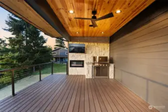 Outdoor cooking space, smart TV, Fireplace!