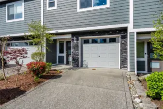 Flat Driveway. Single Door 2 Car Garage.