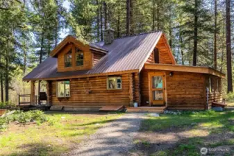 Well designed for country living. Back door to mud room/laundry area.
