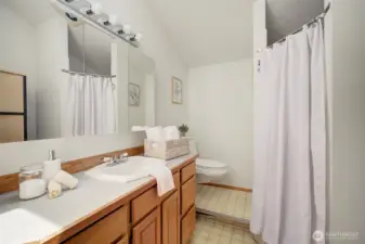 Bathroom in Studio Apartment  includes a walk-in shower