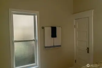 Large window in bathroom