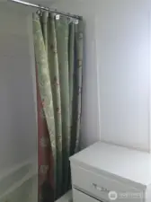 Ensuite master bath with jetted tub, ceramic tile tub surround