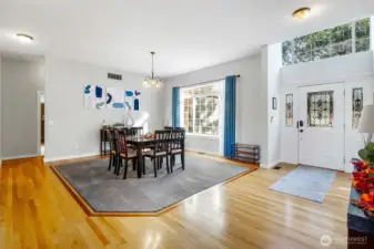Spacious dining room boasts tall ceilings throughout.