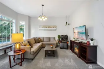 Huge living room off the entry. Newer carpet throughout as well.