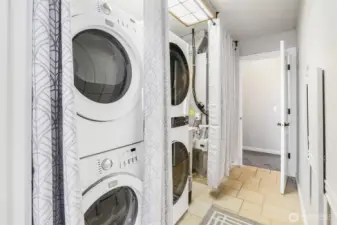Space for two stackable washer and dryers. Only one set is included.