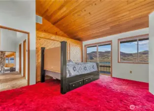 Primary Bedroom with has sliding door access to deck