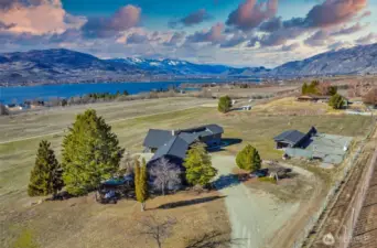 Sweeping views of Lake Osoyoos towards Osoyoos, BC with mountain backdrops
