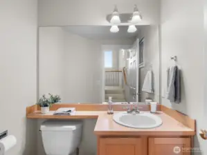 half bath steps from kitchend