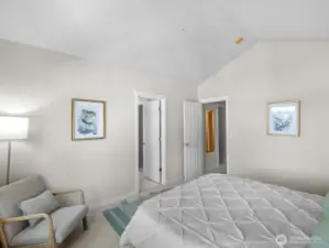 Main bath entrance facing bed