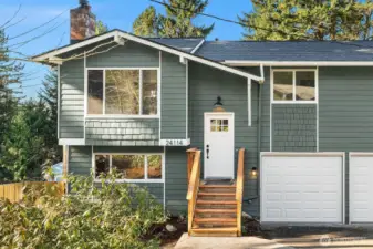 New roof, exterior paint & garage doors!