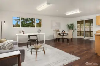 Lower level opens to covered deck - wonderful for year-round outdoor enjoyment.