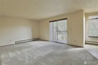 Living Room with slider opening to deck