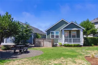 Adorable beach cottage! Sits on great community green-space.
