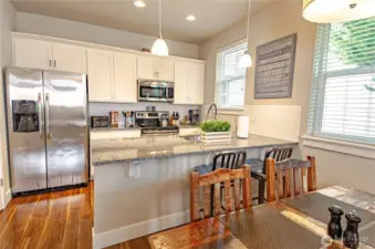 Lots of cabinets and counter space. Kitchen offers a breakfast bar that can seat up to 4 people.