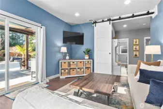 Lower family room with direct access to pool, hot tub & backyard