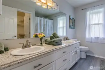 Full en suite bathroom with double vanity