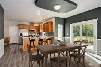 Eating area off kitchen - virtually staged