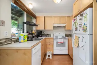 Each unit offers a well-functioning kitchen with ample custom cabinets and counter space.
