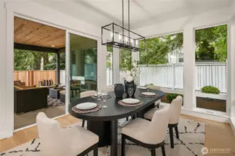 Nook opens to covered patio fireplace