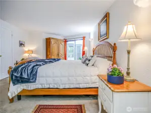 Primary suite with ensuite bathroom and walk in closet