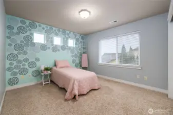 One of two oversized guest bedrooms upstairs.