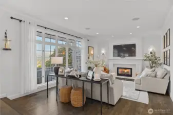 Large open family room space is so charming and inviting. Views of Rainier abound as you will see in next shot.