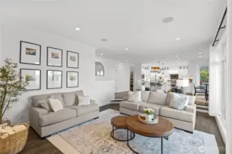 View from family room looking back to kitchen shows the great open space from kitchen to family/living room.