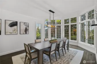 Formal dining room area with views and lots of natural light make up the perfect gathering area for large groups.