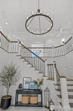 Coffered ceilings with custom lighting will take your breath away.