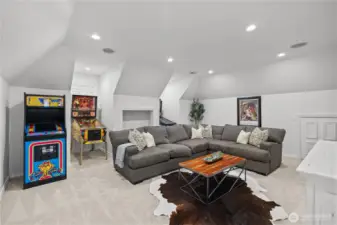 Upstairs bonus room is a large gathering space or could be used as a 5th bedroom. Lots of natural light and flexibility with this space with a full bathroom.